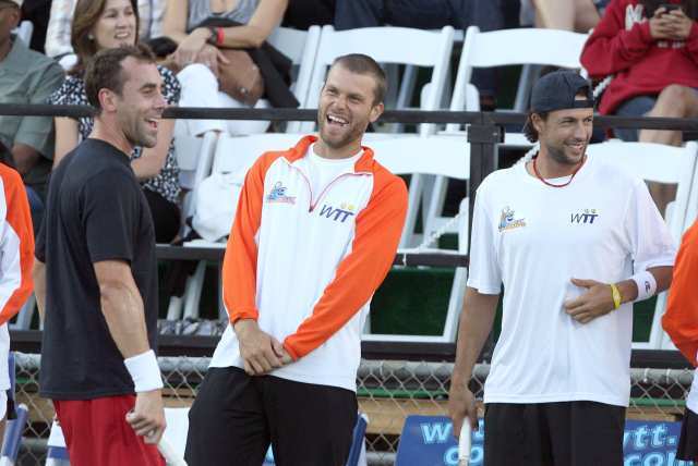 The Washington Kastles' Bobby Reynolds, left, and Newport Beach Breakers Travis Rettenmaier, center, and Lester Cook share a laugh between matches.