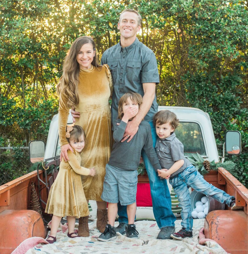 Melissa and Torey Mallon with their children, from left, Carrington, Asher and Grey.