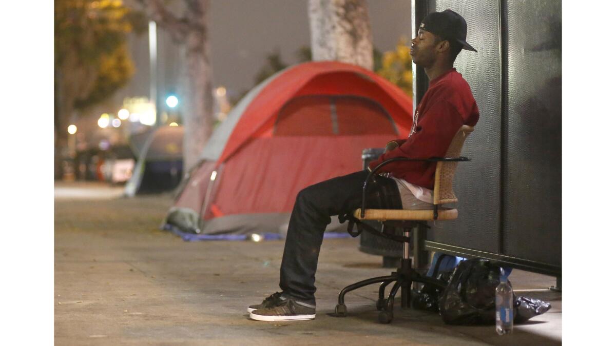 Diandre Pope, 31, stays in an encampment on Hollywood Boulevard.