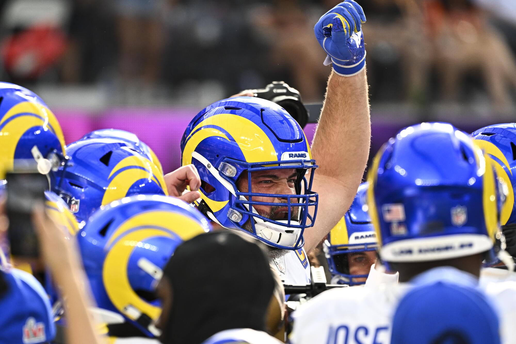  Rams offensive tackle Andrew Whitworth raises his fist before the start of the game.