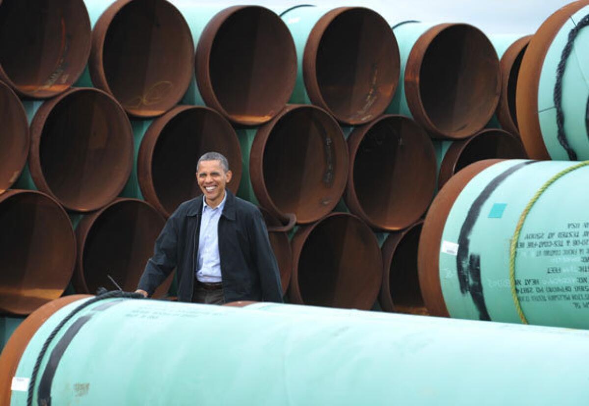 President Obama arrives to speak at the TransCanada Stillwater pipe yard in Cushing, Okla., on March 22, where he promised to expedite construction of a new pipeline from Cushing to the Gulf Coast. Permits for that project could be issued as early as Monday.