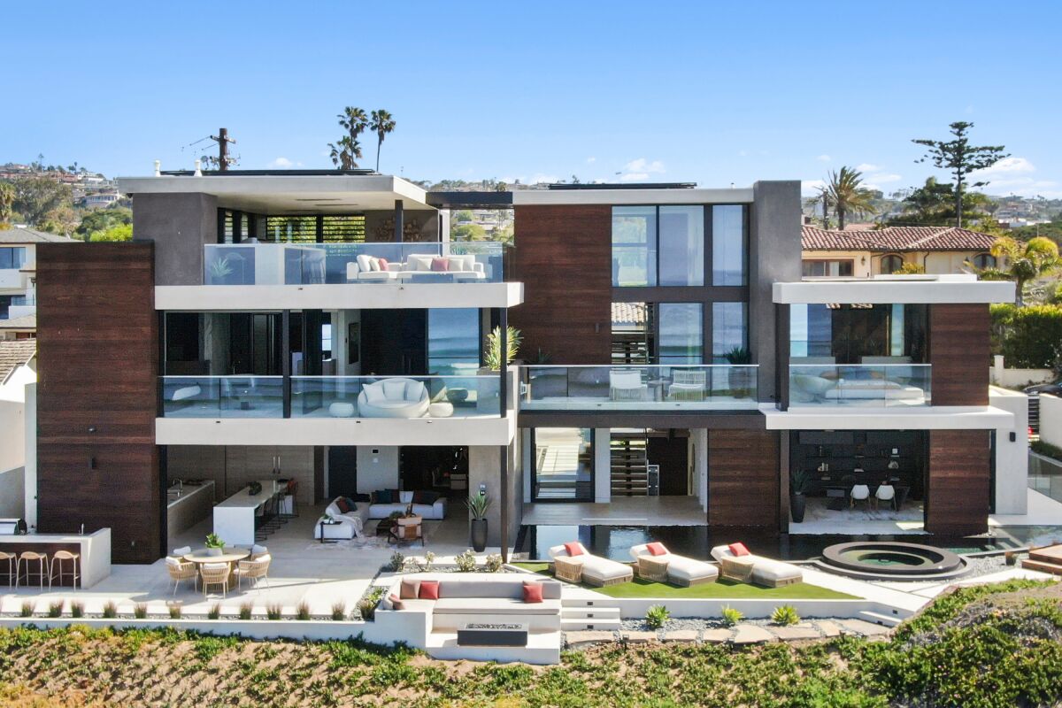 The oceanfront Ora House has five bedrooms and eight bathrooms in 8,878 square feet spread over four levels.