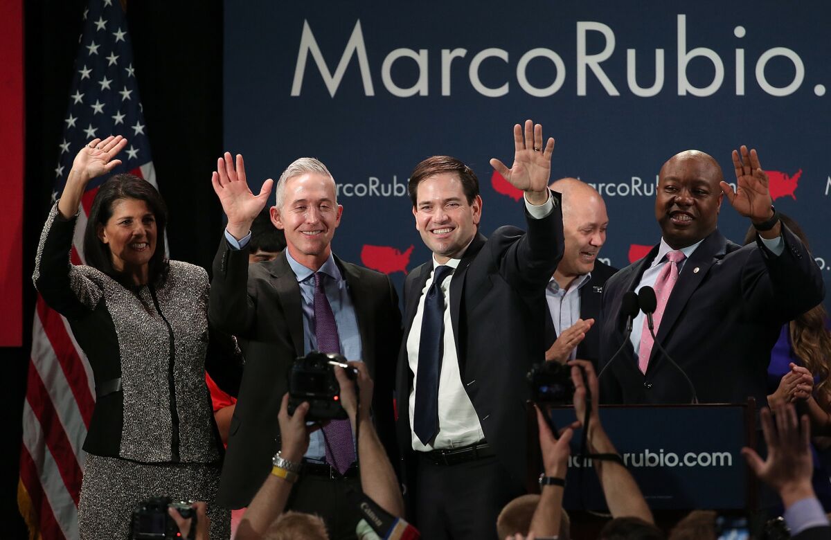 Republican presidential candidate Marco Rubio, second from right, celebrates with, left, South Carolina Gov. Nikki Haley, Rep. Trey Gowdy (R-S.C.) and Sen. Tim Scott (R-S.C.) at a primary night rally on Feb. 20 in Columbia, S.C.