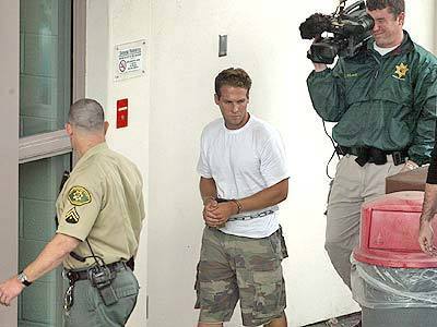 Jesse James Hollywood, wanted in the August 2000 kidnapping and slaying of Nick Markowitz, 15, arrives at Santa Barbara Sheriff's station.