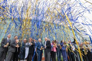 LOS ANGELES, CA - JUNE 16: Streamers bring to a close the grand opening ceremony at the Japanese American National Museum in Little Tokyo for the Metro lines A and E regional connectors on Friday, June 16, 2023. (Myung J. Chun / Los Angeles Times)