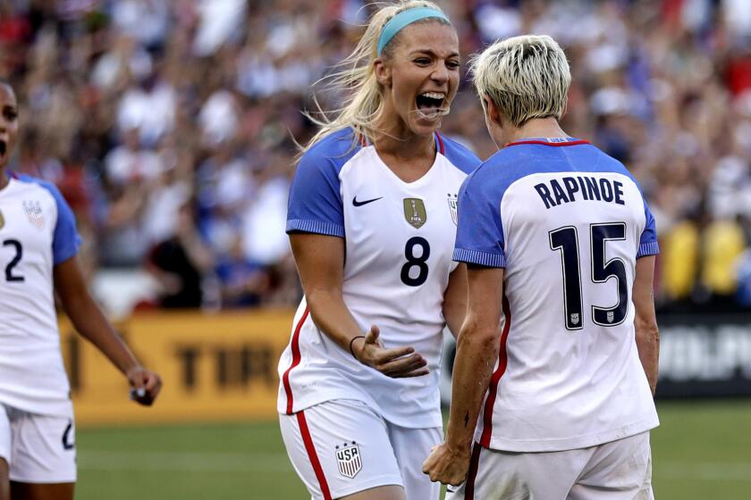 United States midfielder Megan Rapinoe (15) reacts with teammates midfielder Julie Ertz (8), forward Mallory Pugh (22) and midfield Carli Lloyd (10) after scoring a goal against Brazil during the second half of a Tournament of Nations women's soccer match Sunday, July 30, 2017, in San Diego. The United States won, 4-3. (AP Photo/Gregory Bull)