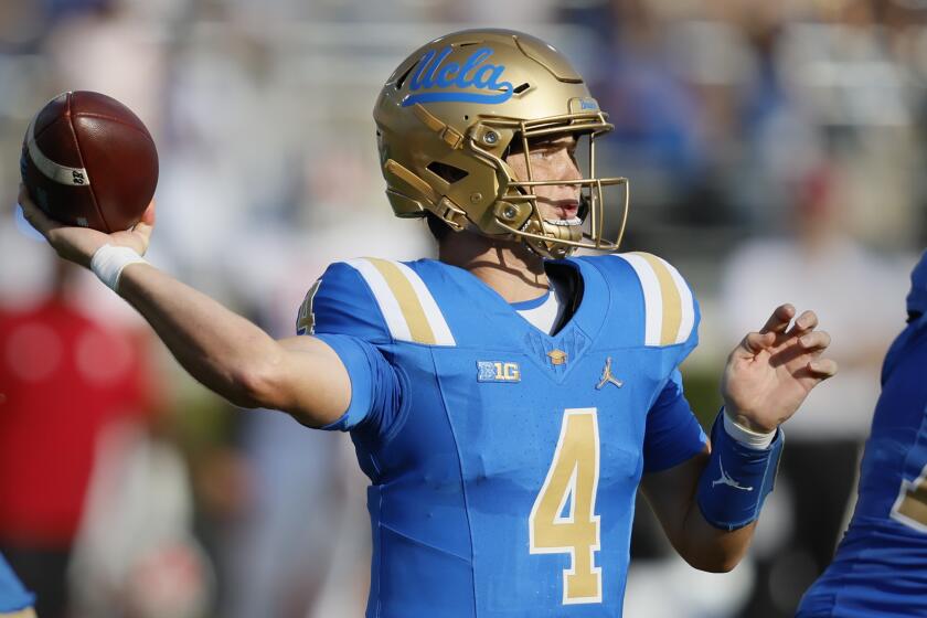 Pasadena, CA - September 14: UCLA quarterback Ethan Garbers, #4, passes the ball against Indiana.