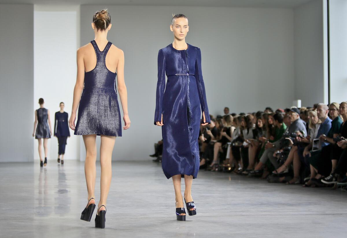 Two looks from the Calvin Klein Spring 2015 collection are shown.