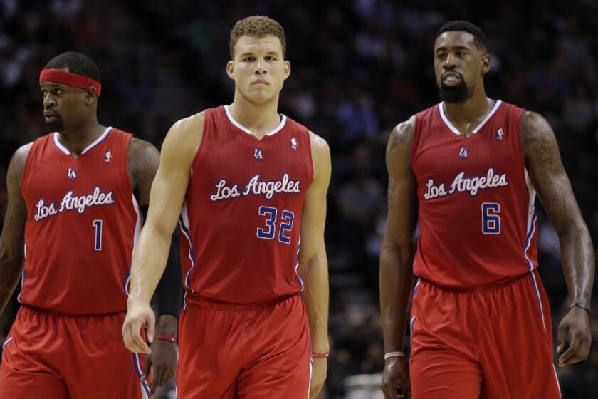 Stephen Jackson, left, with Blake Griffin and DeAndre Jordan.