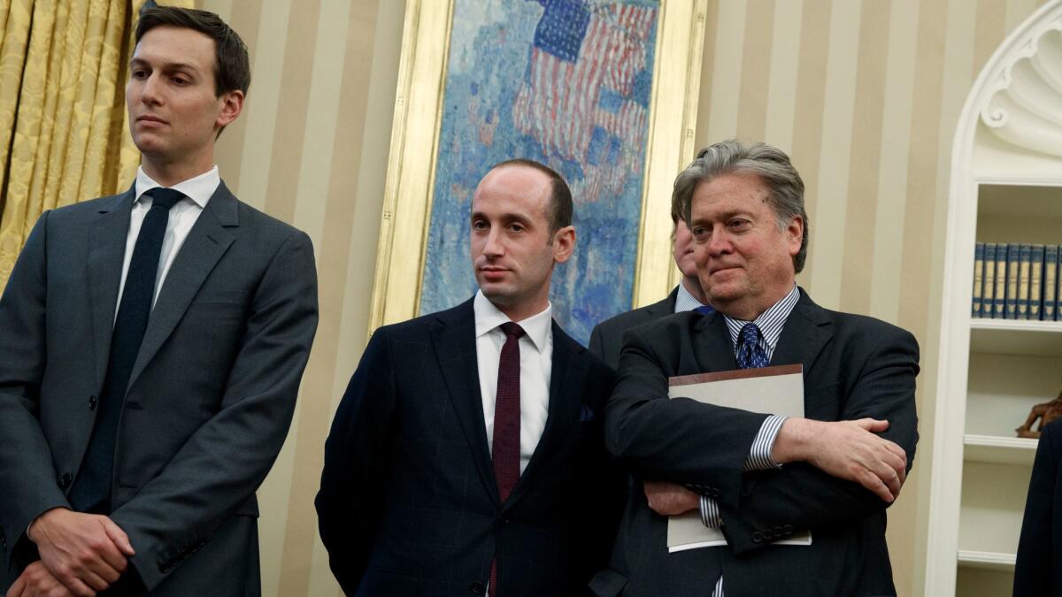 Stephen Miller, center, with Jared Kushner, left, and Stephen Bannon in the Oval Office.
