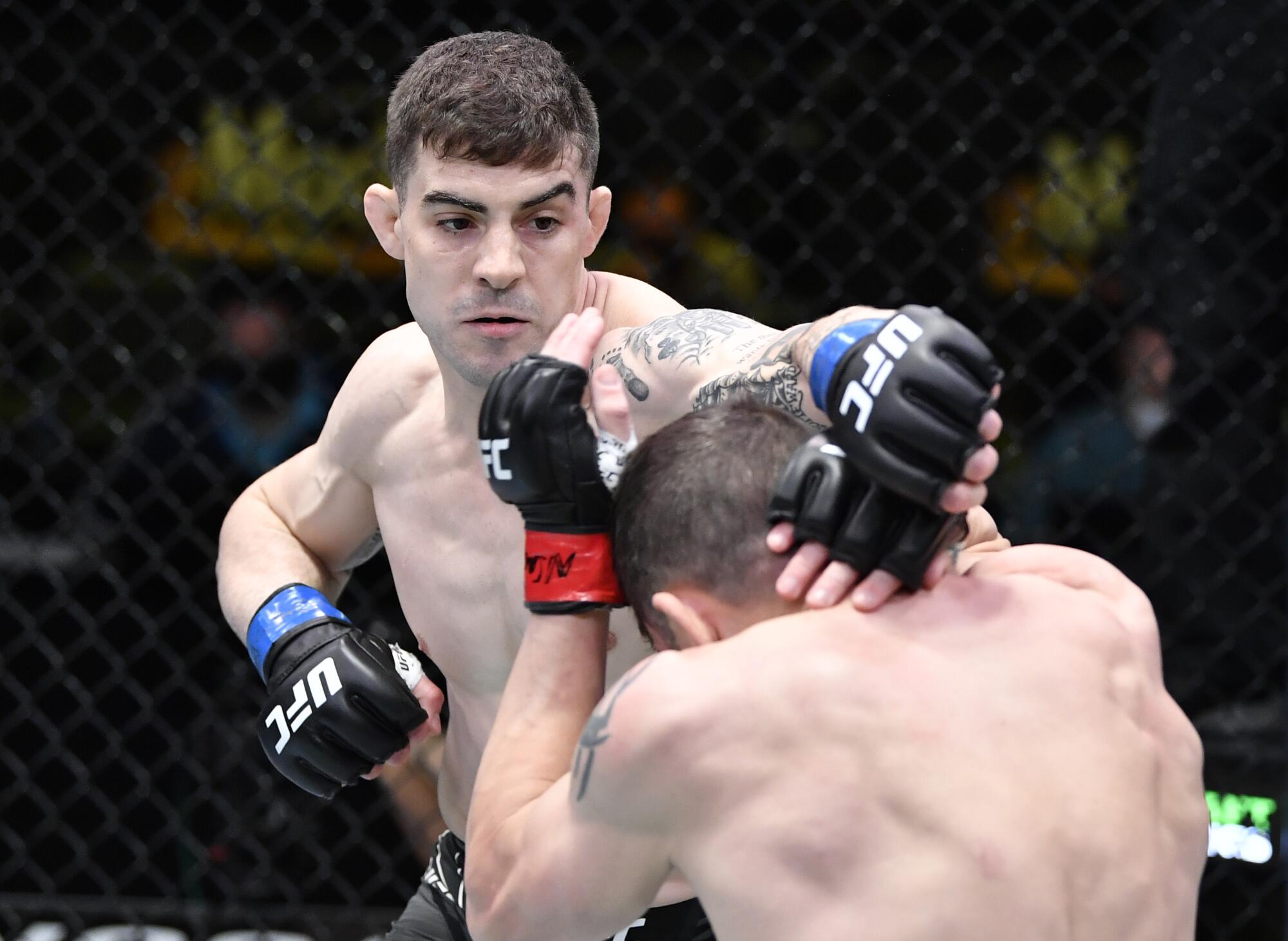 LAS VEGAS, NEVADA - APRIL 10: (L-R) Joe Solecki punches Jim Miller.