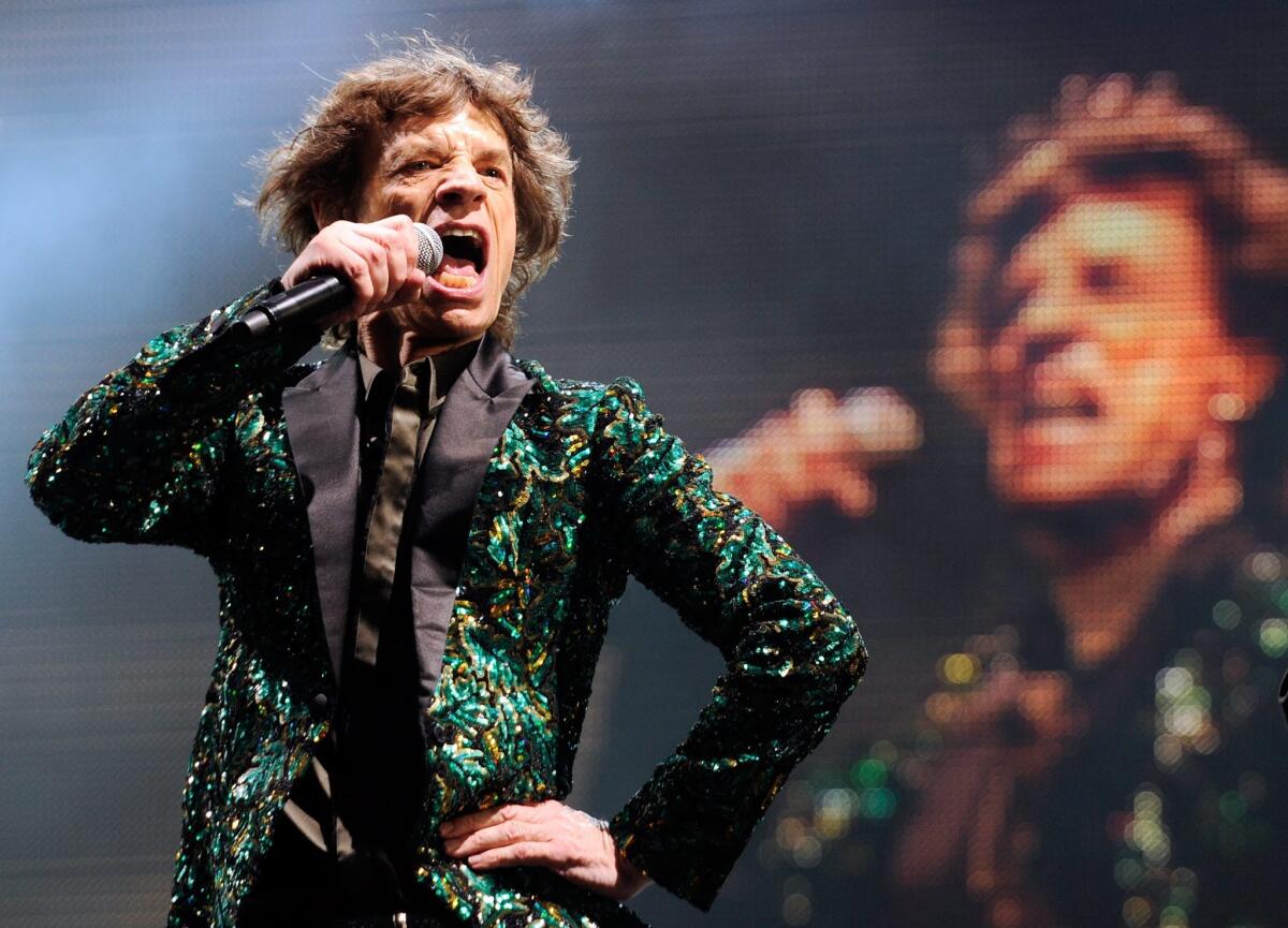 Rolling Stones lead singer Mick Jagger, shown during the group's June performance at the Glastonbury Festival in England, turned 70 on July 26.
