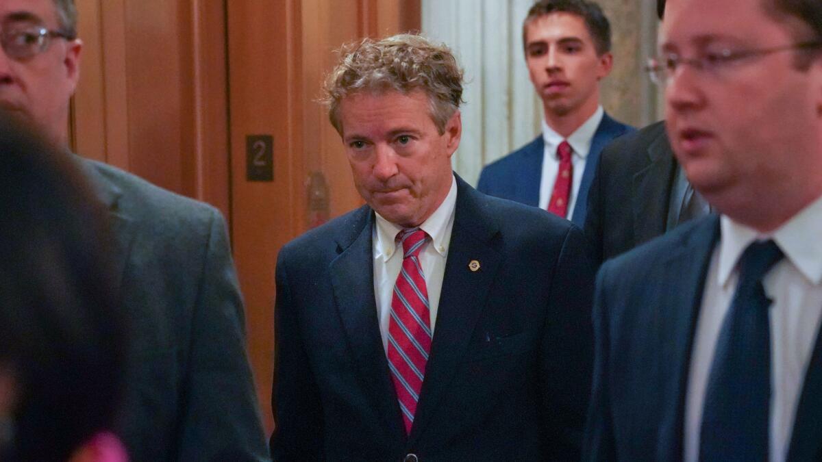 Sen. Rand Paul (R-Ky.), returned to Capitol Hill on Monday after suffering injuries in an attack, with plans to undermine the Affordable Care Act via the GOP tax bill.