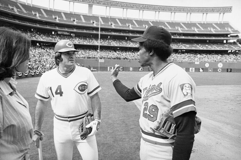 Cincinnati Reds Pete Rose, left, talks with Minnesota Twins Rod Carew on Monday, July 11, 1978 in San Diego, where both were working out for Tuesday All-Star game.
