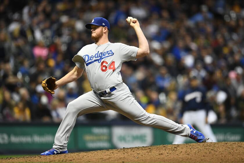 MILWAUKEE, WISCONSIN - APRIL 18: Caleb Ferguson #64 of the Los Angeles Dodgers throws a pitch during the seventh inning against the Milwaukee Brewers at Miller Park on April 18, 2019 in Milwaukee, Wisconsin. (Photo by Stacy Revere/Getty Images)