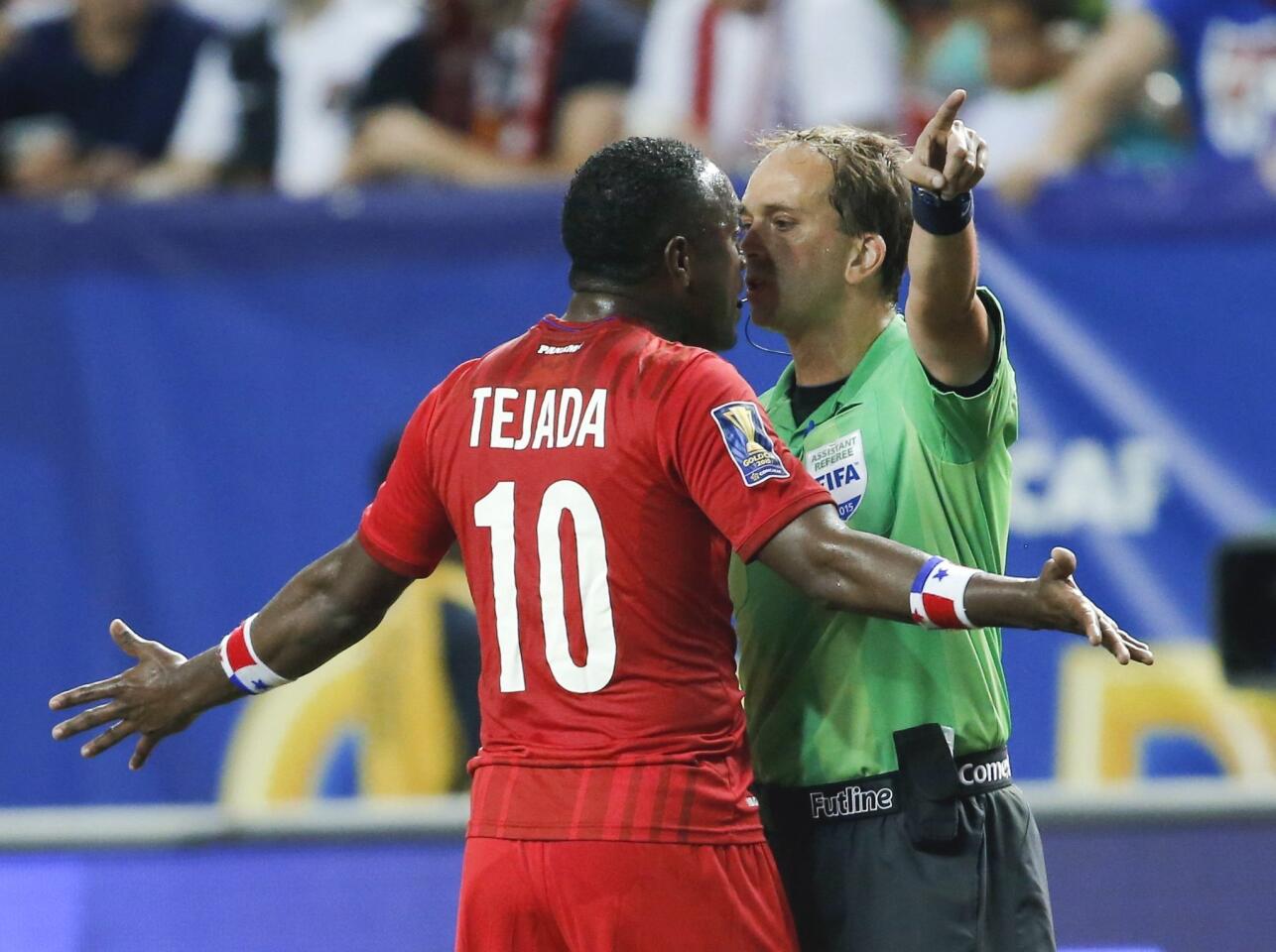 Panama's Luis Tejada (10) argues with an official during the first half against Mexico in a CONCACAF Gold Cup soccer semifinal, Wednesday, July 22, 2015, in Atlanta. (AP Photo/John Bazemore)