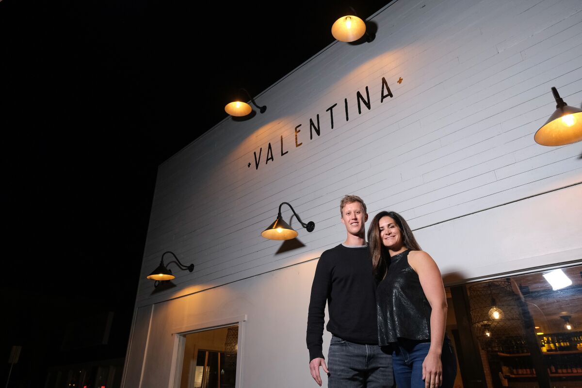 SAN DIEGO, CA-NOVEMBER 13, 2019: David and Carina pose for a photo in front of Valentina in Encinitas after spending the initial part of their date next door at CLAY + CRAFT in Encinitas. (Misael Virgen / PACIFIC Magazine)