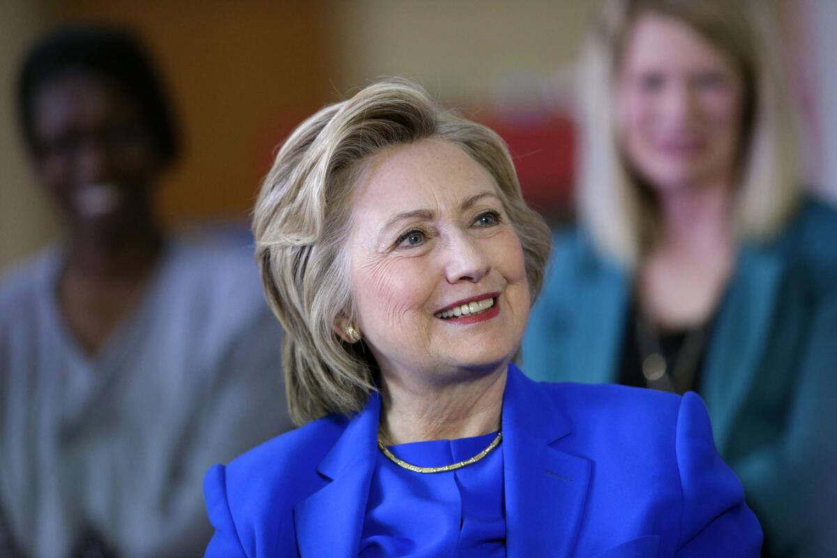Democratic presidential candidate Hillary Clinton speaks with young parents during a roundtable discussion at the Family Care Center in Lexington, Ky. on May 10.