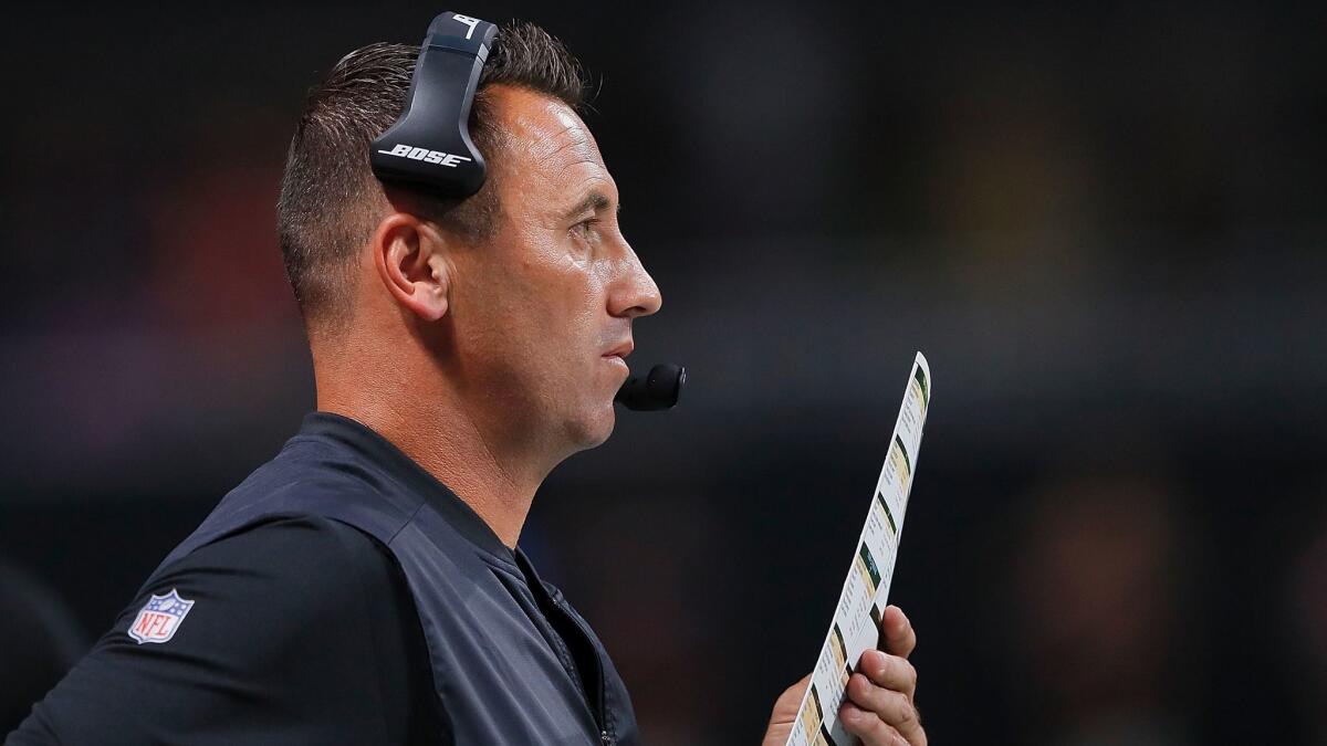 Atlanta Falcons offensive coordinator Steve Sarkisian calls plays from the sidelines during a preseason game against Arizona on Aug. 26.