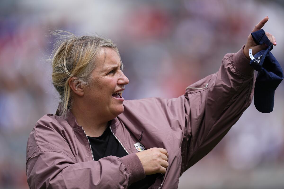 U.S. women's national team coach Emma Hayes waves to fans before Saturday's international friendly win over South Korea.