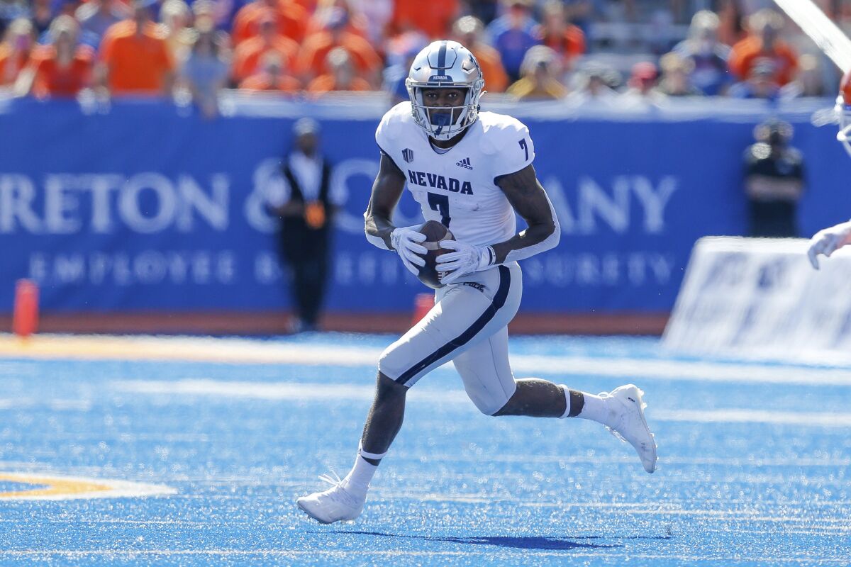 Nevada wide receiver Romeo Doubs (7) runs with the ball on a reverse against Boise State.