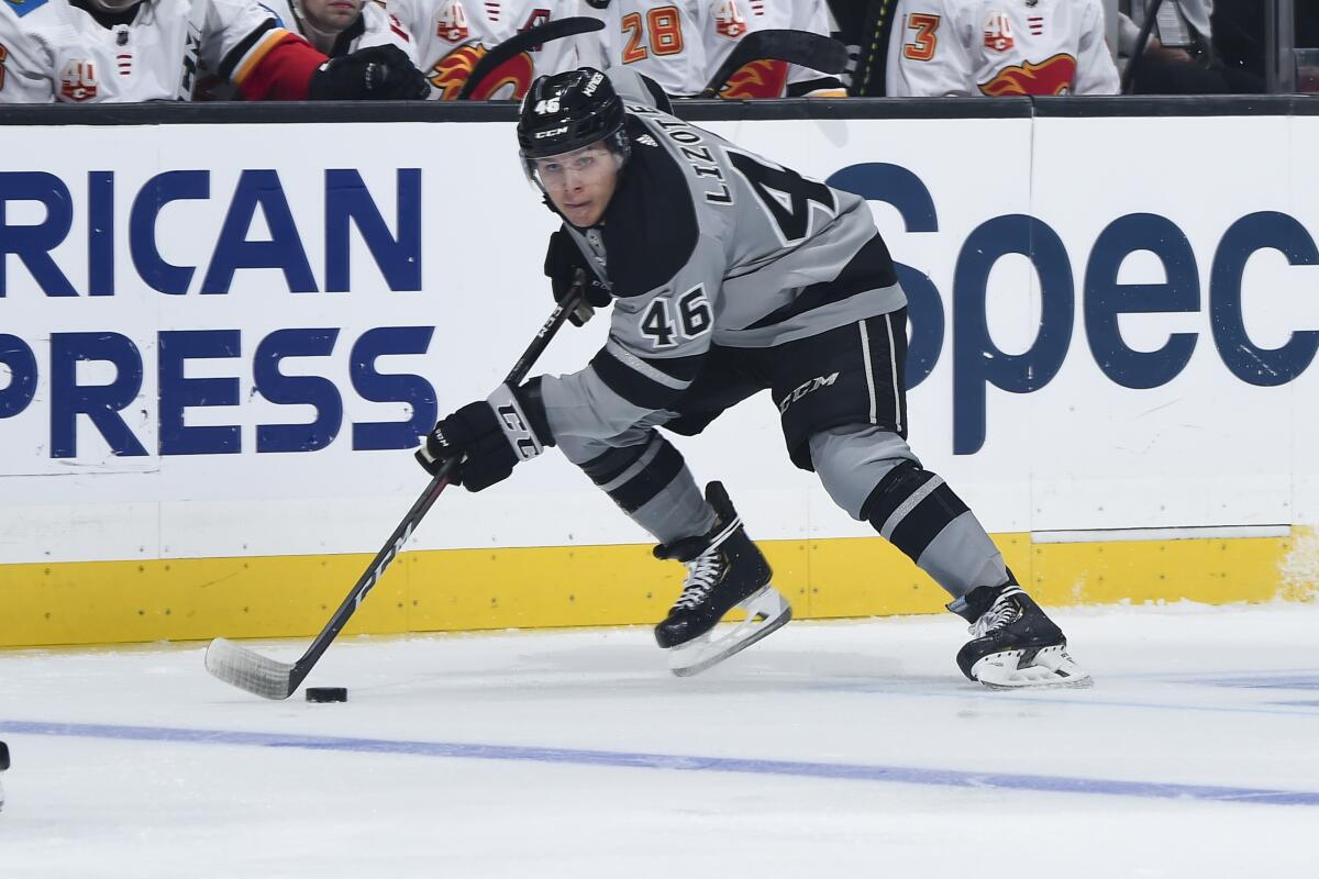 Kings forward Blake Lizotte skates with the puck against the Calgary Flames on Oct. 19.