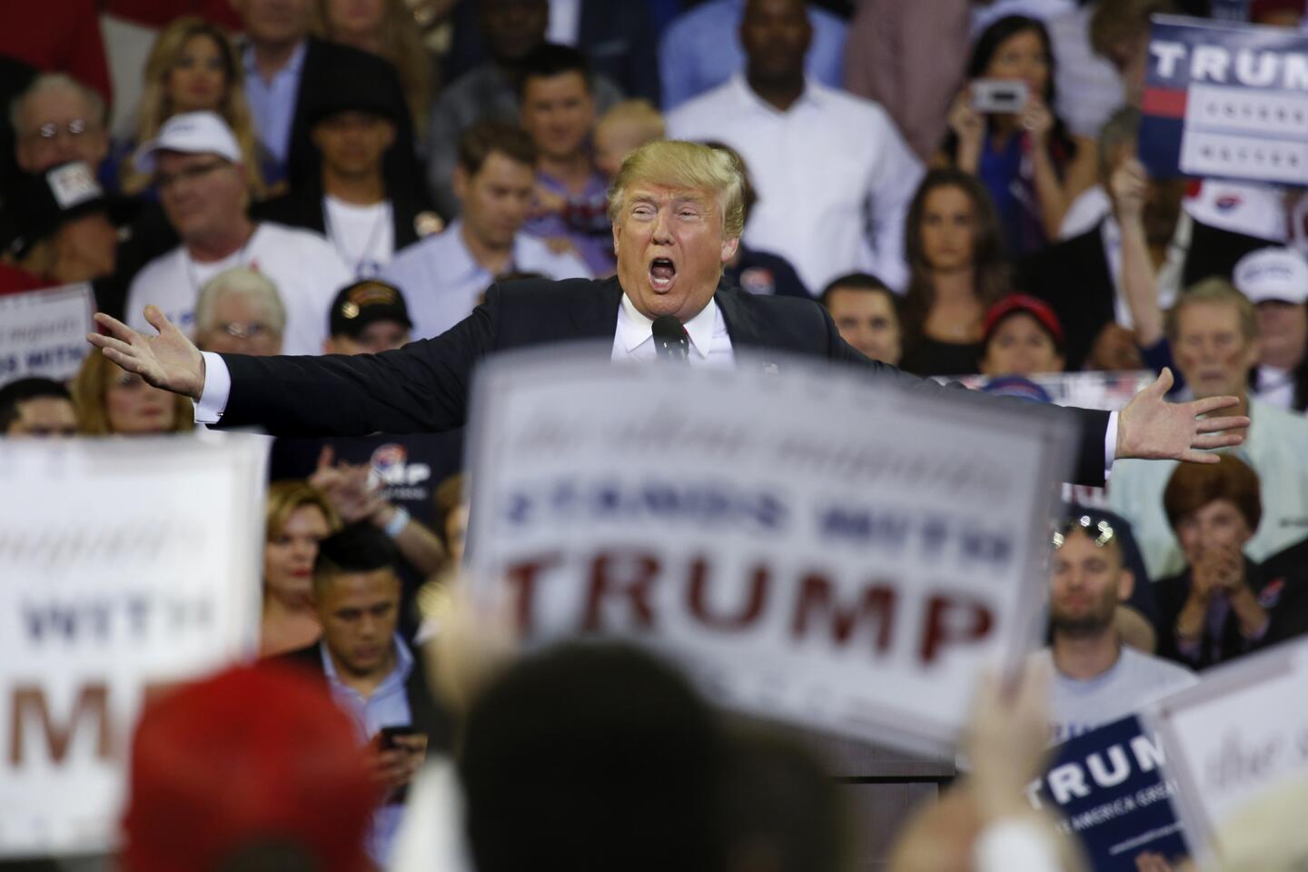 More than 9,000 people attended a rally at the CFE Arena in Orlando, Fla., for Republican presidential candidate Donald Trump, with many more turned away at the gates.