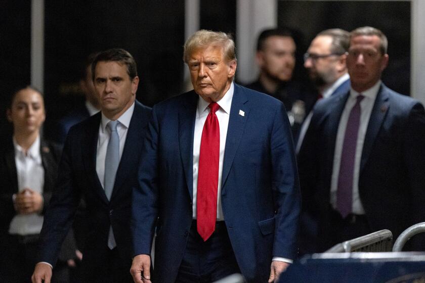 Former US President Donald Trump, center, and Todd Blanche, attorney for former US President Donald Trump, second left, at Manhattan criminal court in New York, US, on Thursday, April 25, 2024. Trump faces 34 felony counts of falsifying business records as part of an alleged scheme to silence claims of extramarital sexual encounters during his 2016 presidential campaign. Photographer: Jeenah Moon/Bloomberg via Getty Images