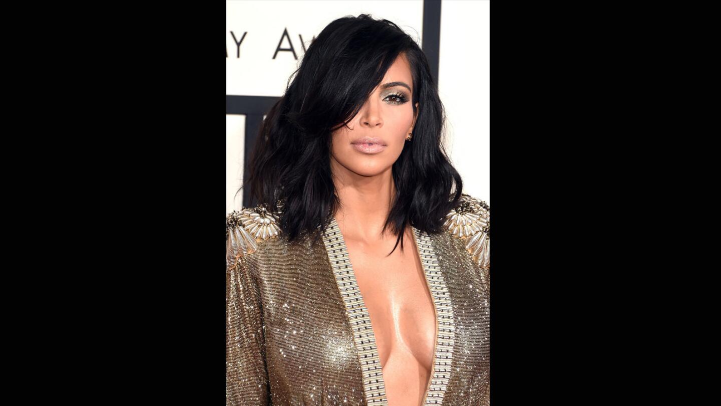 Kim Kardashian's Jean Paul Gaultier robe was open to her waist.