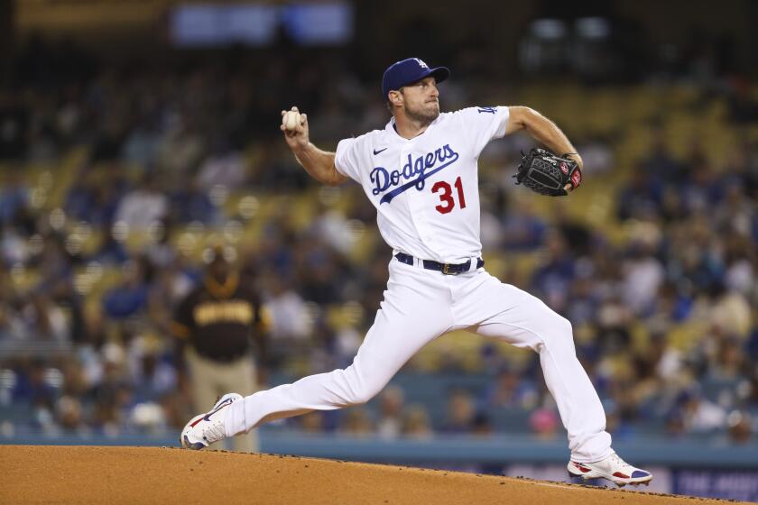 Los Angeles, CA - September 29: Dodgers starting pitcher Max Scherzer delivers a pitch against the San Diego Padres in the first inning at Dodger Stadium in Los Angeles on Wednesday, Sept. 29, 2021. (Allen J. Schaben / Los Angeles Times)