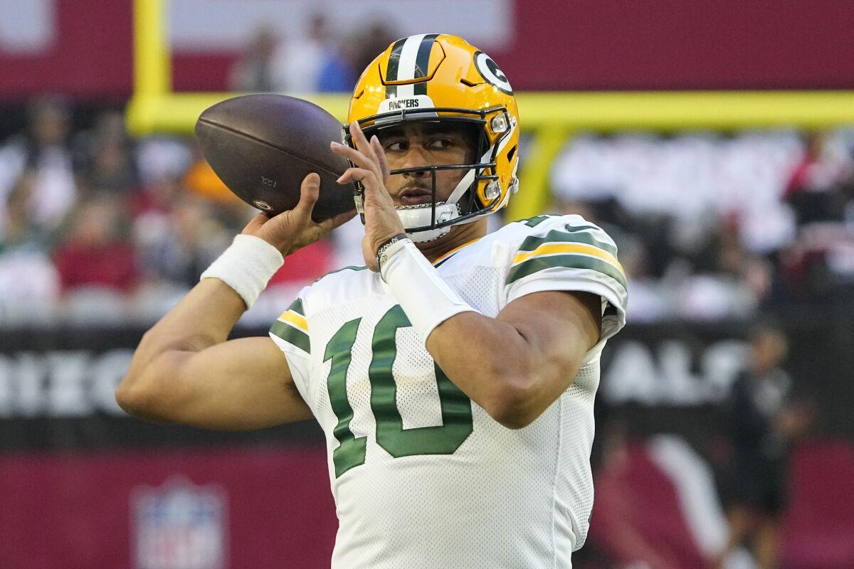 Green Bay Packers quarterback Jordan Love (10) warms up prior to an NFL football game against the Arizona Cardinals, Thursday, Oct. 28, 2021, in Glendale, Ariz. With reigning MVP Aaron Rodgers on the reserve/COVID-19 list and unavailable to play Sunday, Nov. 7, at Kansas City, the Green Bay Packers are about to discover just what they have in quarterback Jordan Love. The 2020 first-round pick from Utah State will make his first career start against the Chiefs.(AP Photo/Rick Scuteri)