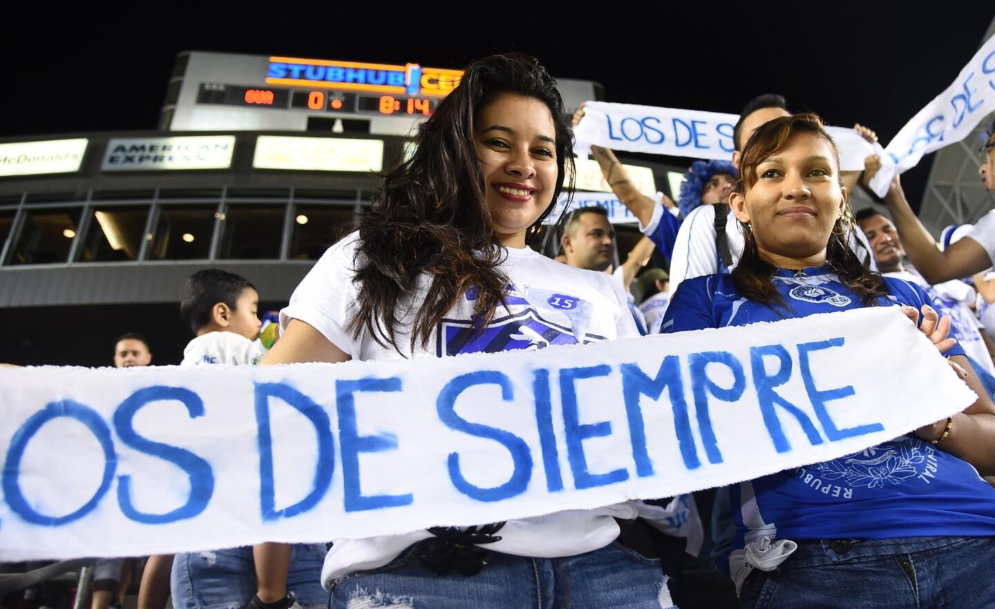 El Salvador fans cheer during the Guatemala vs El Salvador "La Copa Delta" national team soccer friendly on October 13, 2015 at the Stub Hub Center in Carson, California. AFP PHOTO/ ROBYN BECKROBYN BECK/AFP/Getty Images ** OUTS - ELSENT, FPG, CM - OUTS * NM, PH, VA if sourced by CT, LA or MoD **