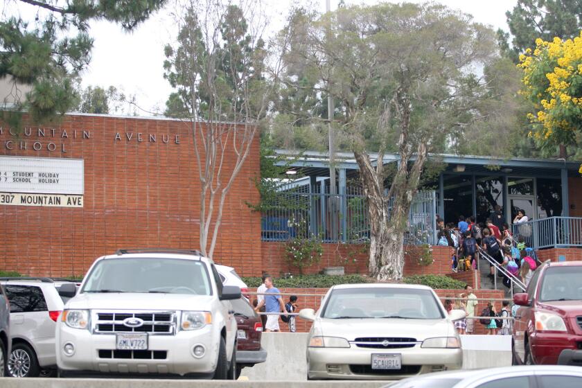 Mountain Avenue School students arrive for class at the La Crescenta elementary campus on Wednesday, Sept. 2, 2015.