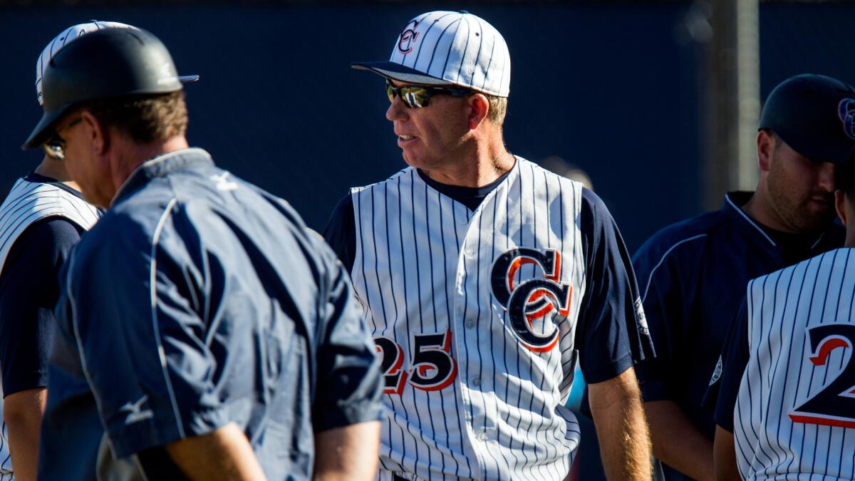 Chatsworth Coach Tom Meusborn talks with his players during a game against Birmingham on March 25.