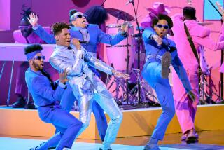 LAS VEGAS, NEVADA - APRIL 03: Jon Batiste performs onstage during the 64th Annual GRAMMY Awards at MGM Grand Garden Arena on April 03, 2022 in Las Vegas, Nevada. (Photo by Matt Winkelmeyer/Getty Images)