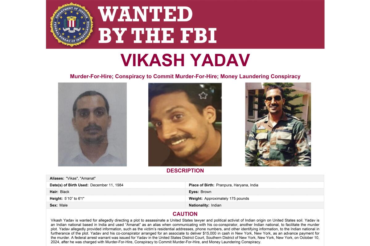 A poster showing Vikash Yadav reads "Wanted by the FBI." 