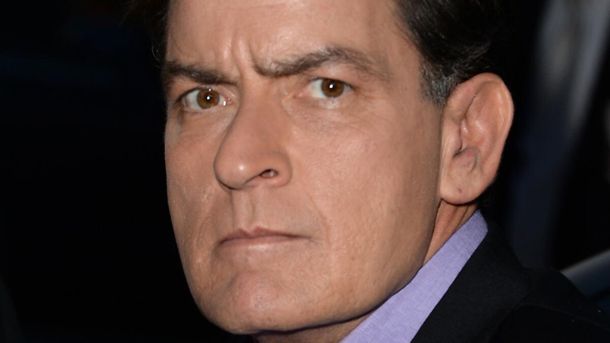 Charlie Sheen's legal team has fired back after ex-fiancee Scottine Ross sued him, with allegations including assault and negligence in exposing her to HIV.