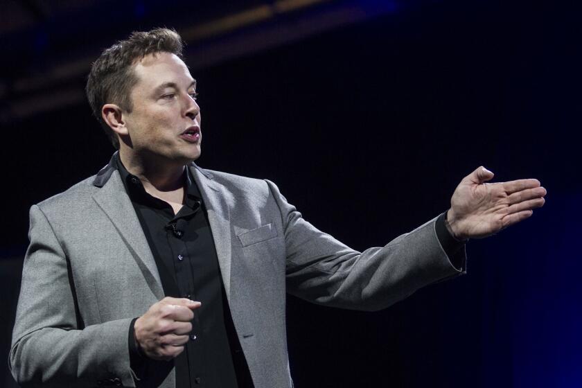Elon Musk, chief executive of Tesla Motors Inc., at the unveiling the company’s Powerwall and Powerpack. He has used Twitter to dispute claims made in an upcoming biography.