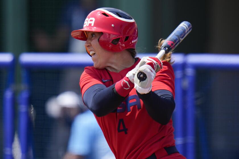 United States' Amanda Chidester watches her hit during a softball game.