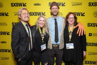 AUSTIN, TEXAS - MARCH 11: (L-R) Daniel Kwan, Claudette Godfrey, Daniel Scheinert and Janet Pierson attend the opening night premiere of "Everything Everywhere All At Once" during the 2022 SXSW Conference and Festivals at The Paramount Theatre on March 11, 2022 in Austin, Texas. (Photo by Rich Fury/Getty Images for SXSW)