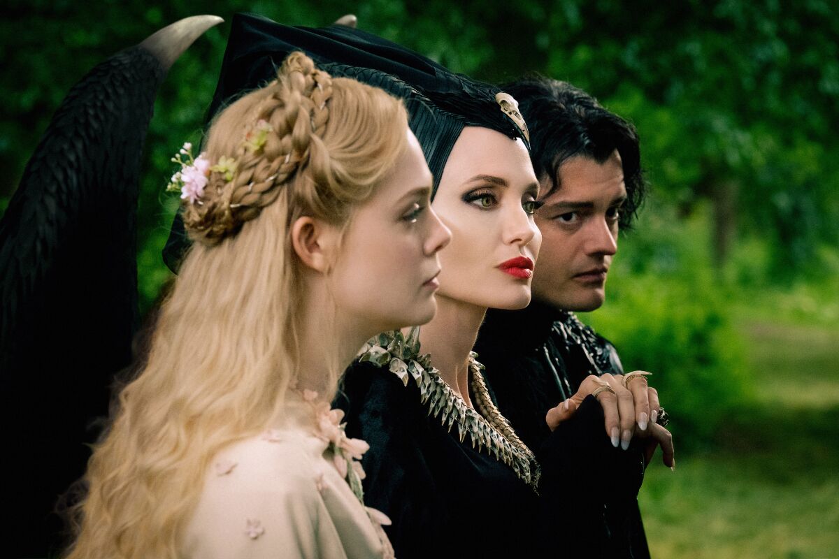 Elle Fanning, Angelina Joley and Sam Riley in the movie "Maleficent: Mistress of Evil."