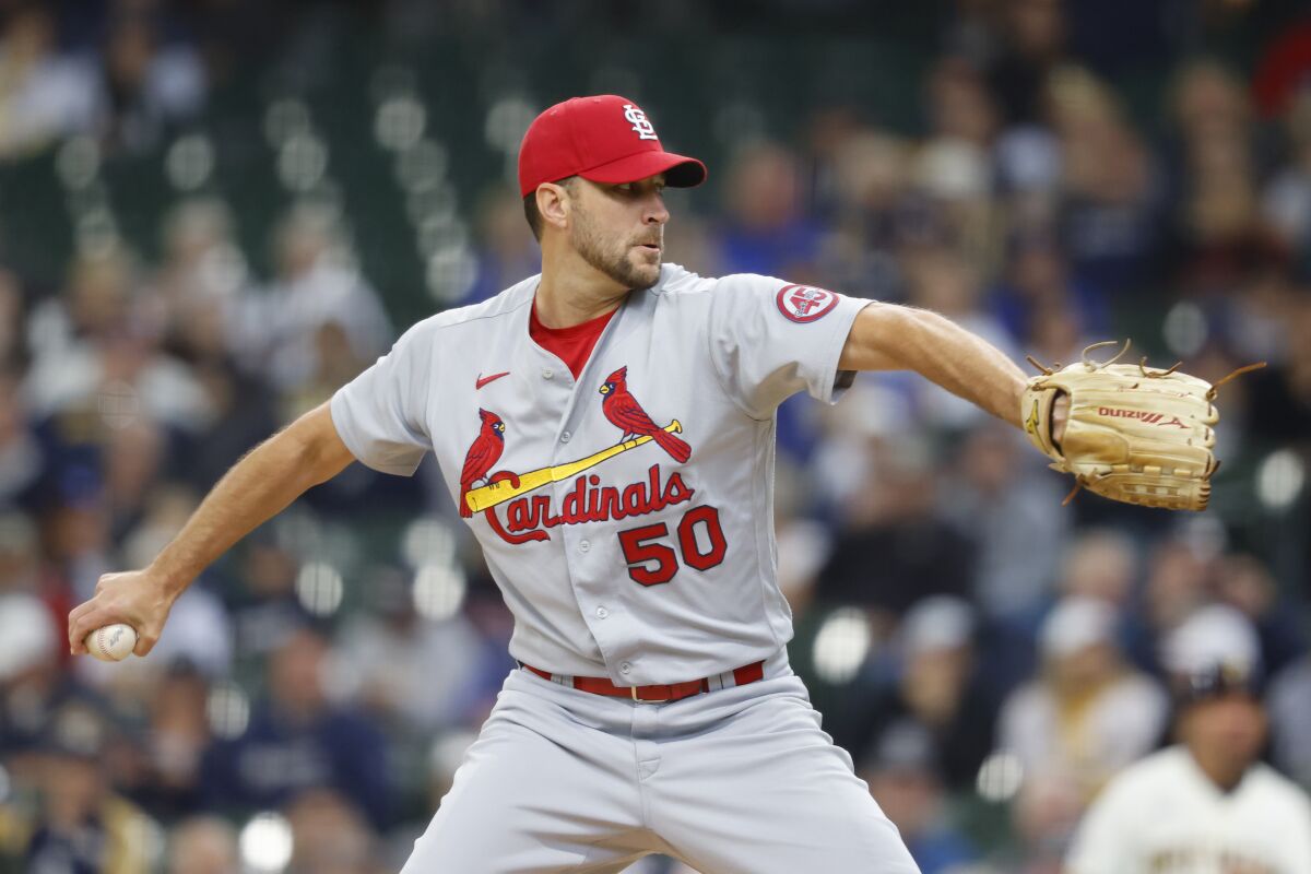 St. Louis Cardinals pitcher Adam Wainwright throws to the Milwaukee Brewers.