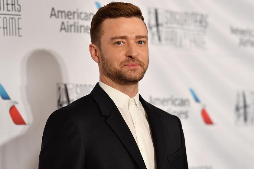Justin Timberlake is apologizing to his family for a drunken night out with his "Palmer" costar.