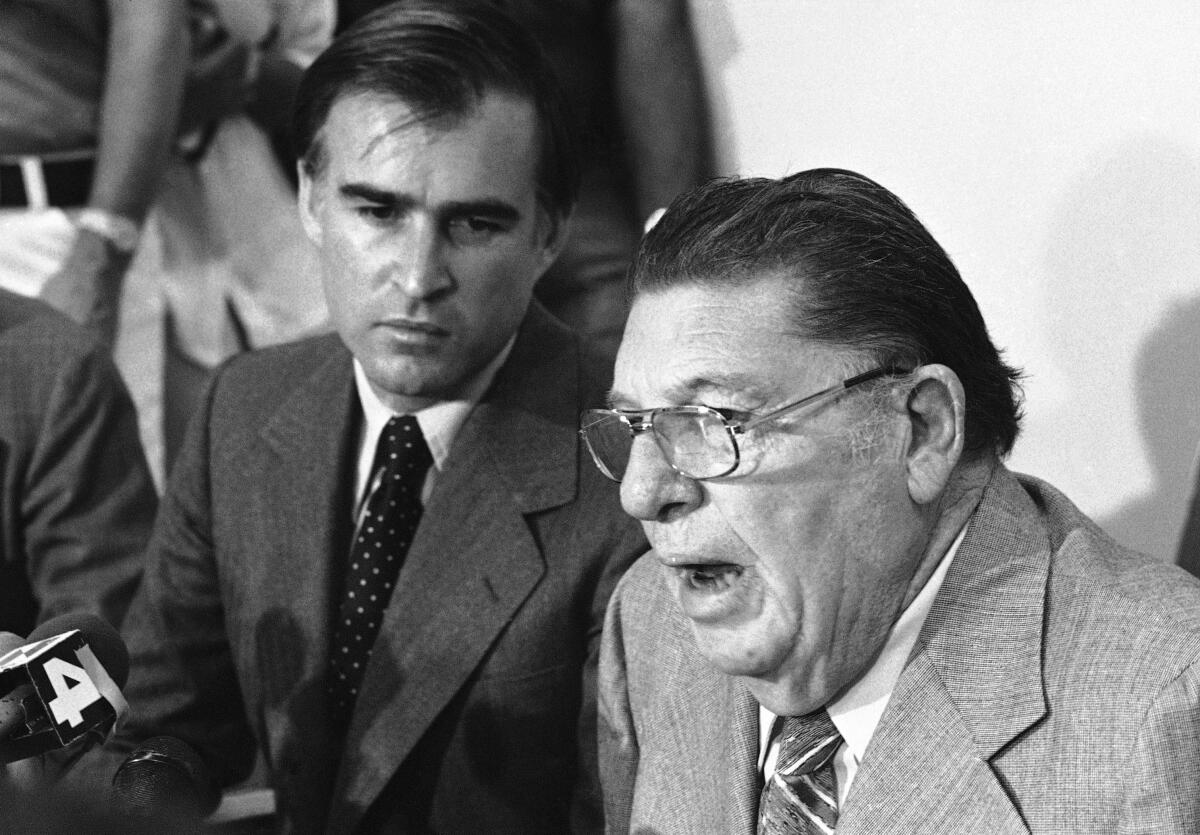 Gov. Jerry Brown Jr., left, and tax crusader Howard Jarvis, in their first public appearance together, told a packed news conference that they favor voluntary rent control in Los Angeles, Tuesday, July 18, 1978. Both urged landlords to shape up or be faced with new laws to force them to share benefits of Proposition 13 with tenants. (AP Photo/Robbins)