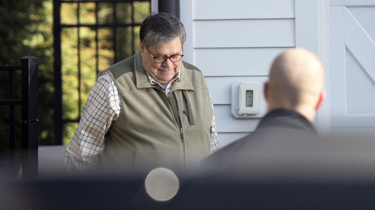 Atty. Gen. William Barr leaves his home in McLean, Va., on Sunday morning.