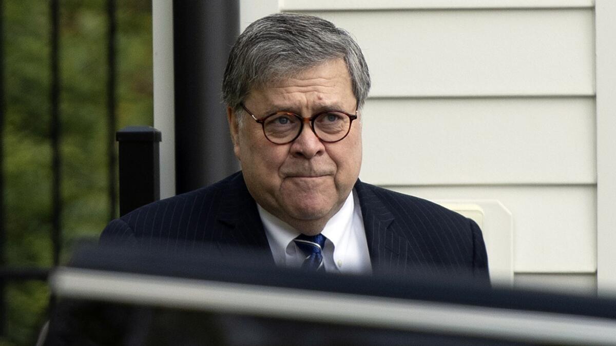 Atty. Gen. William Barr leaves his home in McLean, Va., on Wednesday morning. The Justice Department is preparing to release a redacted version of special counsel Robert S. Mueller III's report on his investigation of Russian interference in the 2016 election.