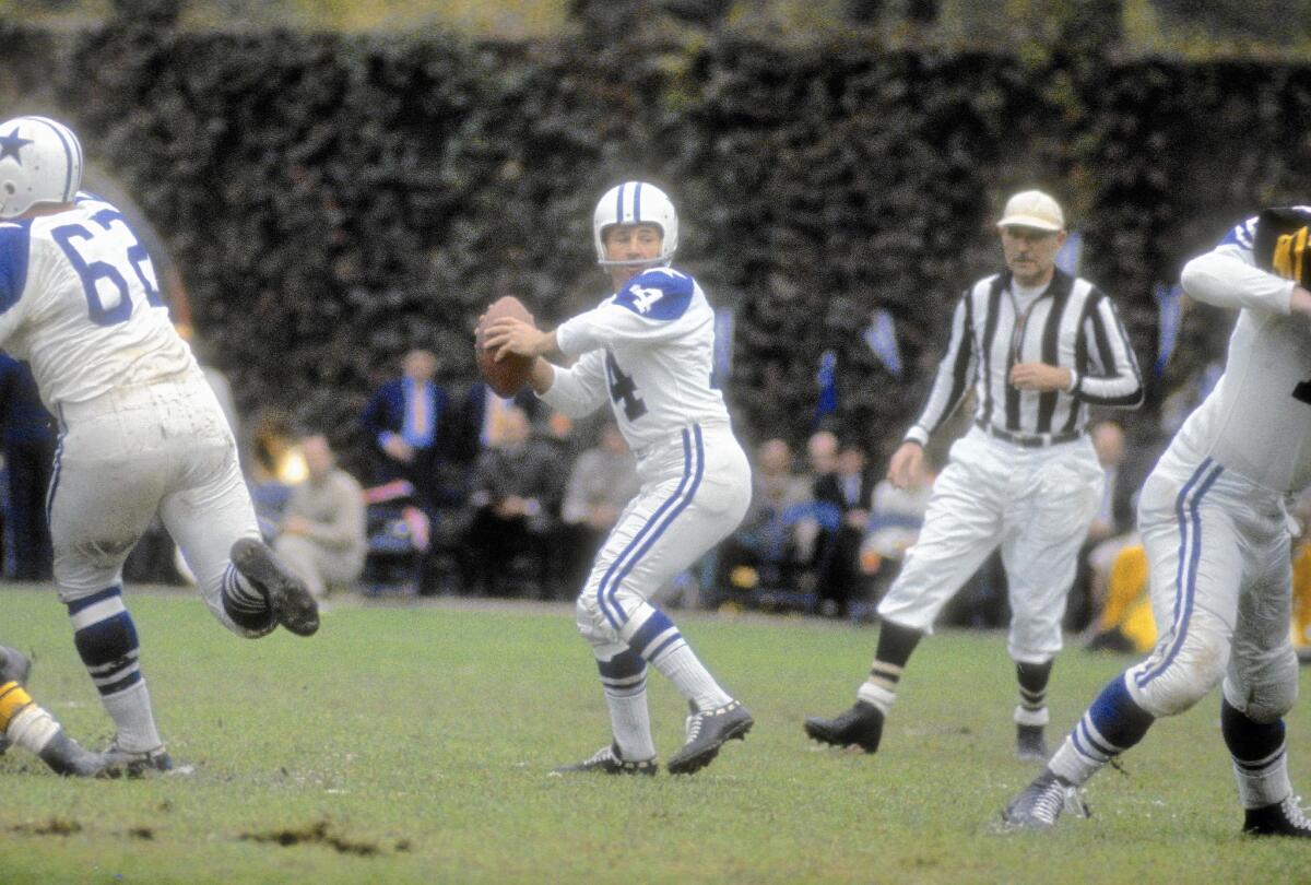 Dallas quarterback Eddie LeBaron drops back to pass against the Pittsburgh Steelers in a 1962 game at Forbes Field. LeBaron, who stood 5 feet 7, was known as the "Little General."