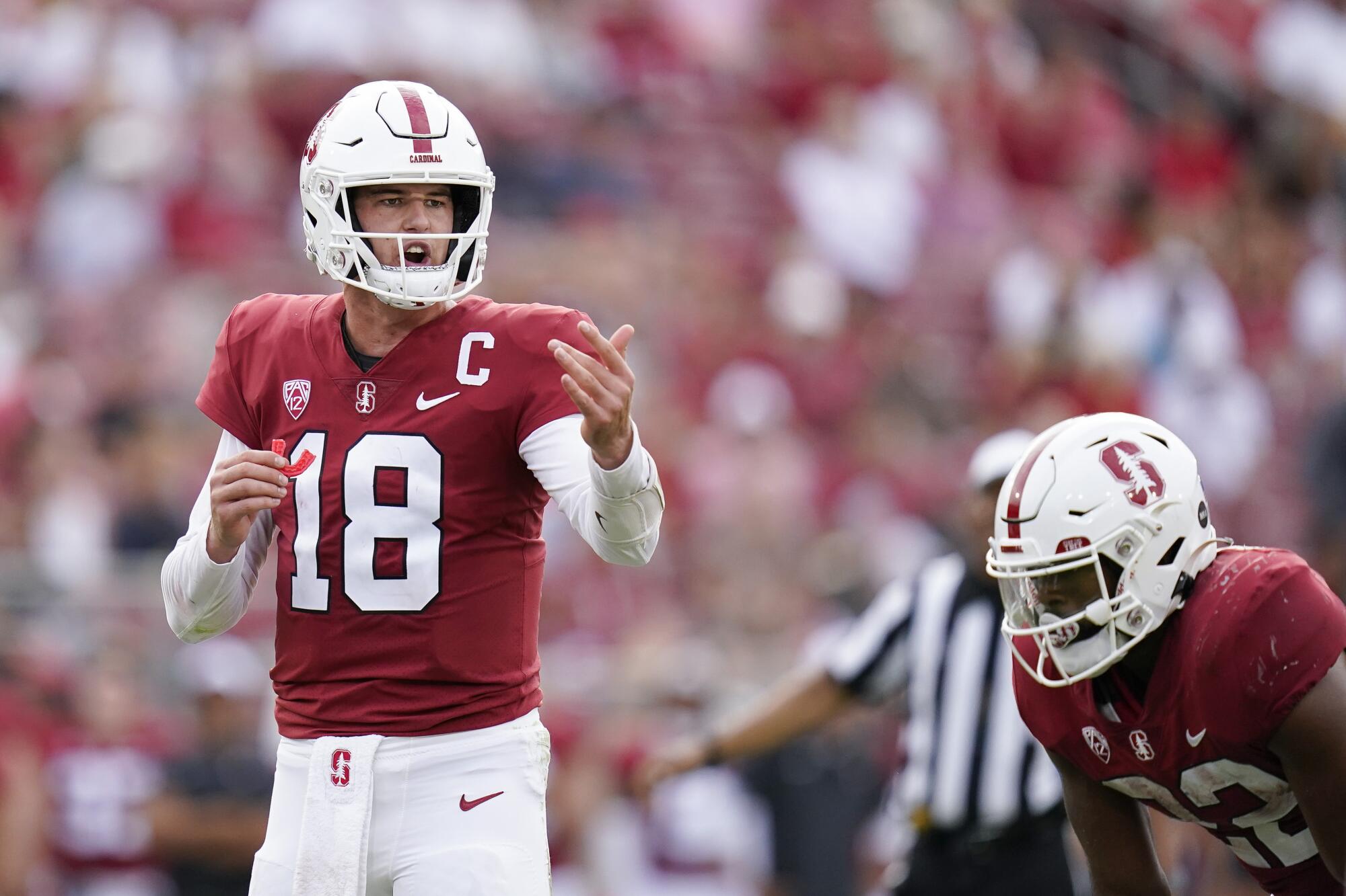 Stanford quarterback Tanner McKee signals to a teammate before snapping the ball against USC in 2022.