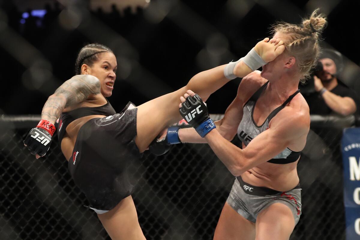 Amanda Nunes' résumé features victories over Holly Holm, above, as well as Ronda Rousey, Miesha Tate and Cris "Cyborg" Justino.