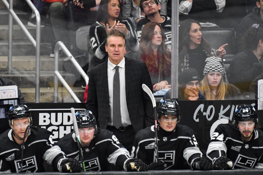 LOS ANGELES, CA - FEBRUARY 10: Los Angeles Kings Jim Hiller looks on from the bench during the second period against the Edmonton Oilers at Crypto.com Arena on February 10, 2024 in Los Angeles, California. (Photo by Juan Ocampo/NHLI via Getty Images)